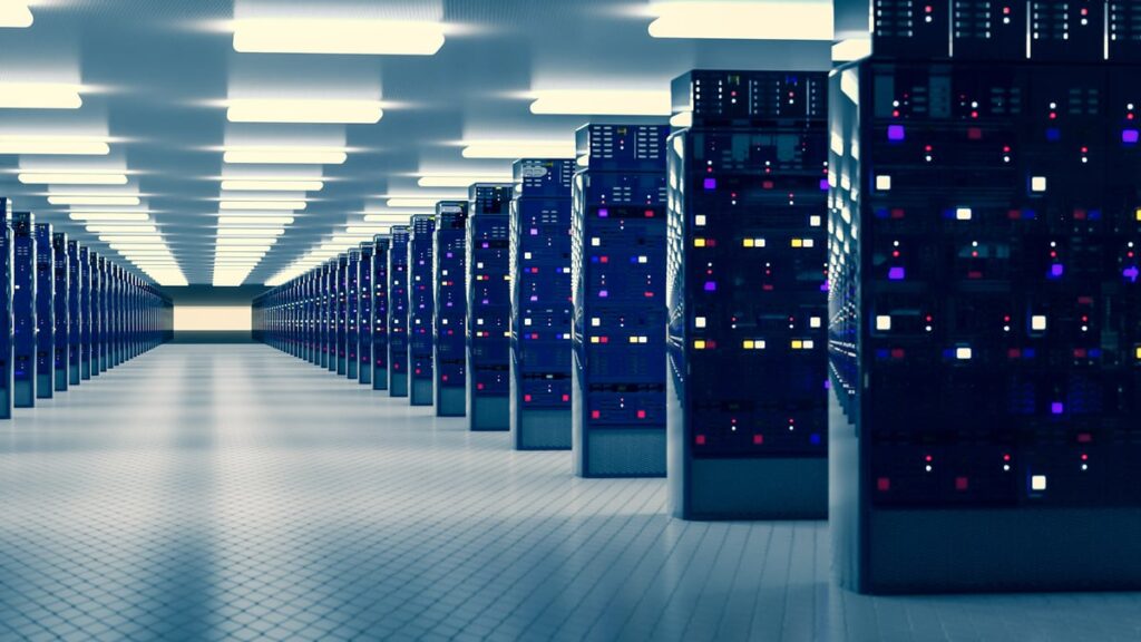 Rows of computer servers inside of a large data center.