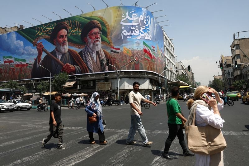 Israel strikes Beirut despite truce, Iran threatens to retaliate