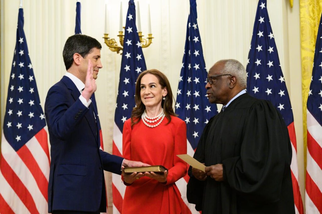 Kevin Warsh being sworn in as Fed chair by Justice Clarence Thomas in the East Room of the White House.