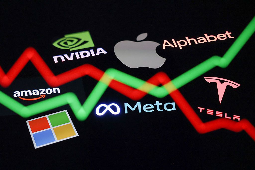 Nvidia, Apple, Alphabet, Amazon, Microsoft, Meta and Tesla logo displayed on a phone screen