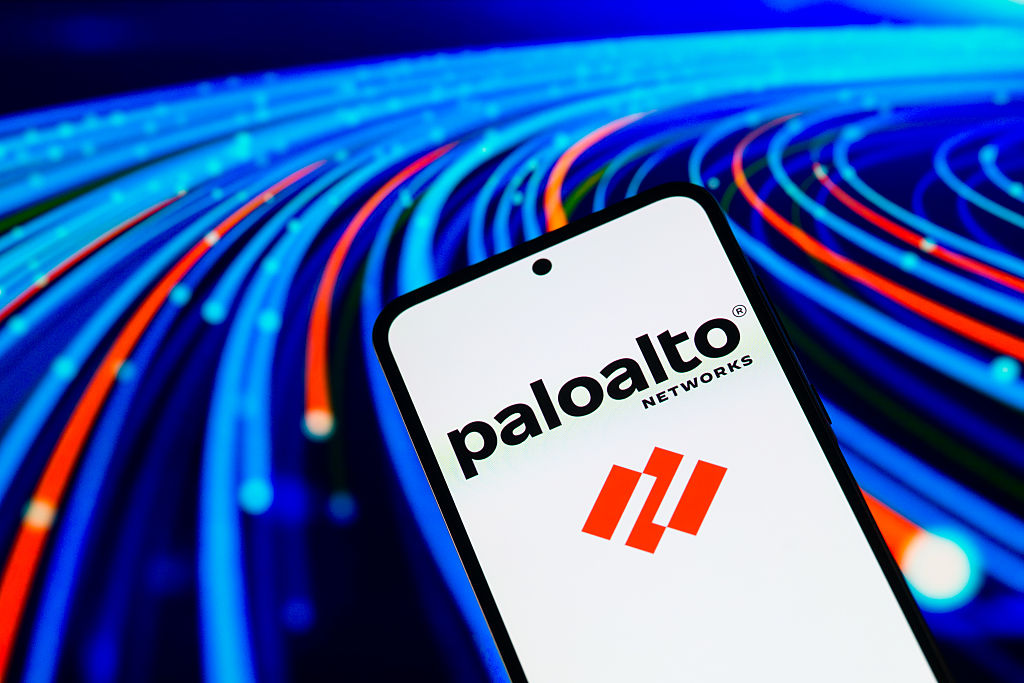The Palo Alto Networks logo displayed on a mobile phone with a visual digital background