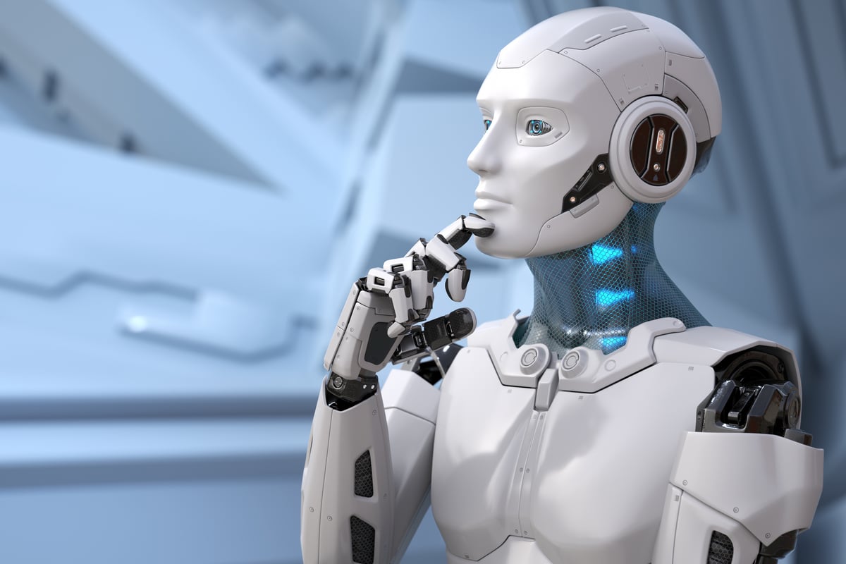 A humanoid robot putting a finger to its chin.