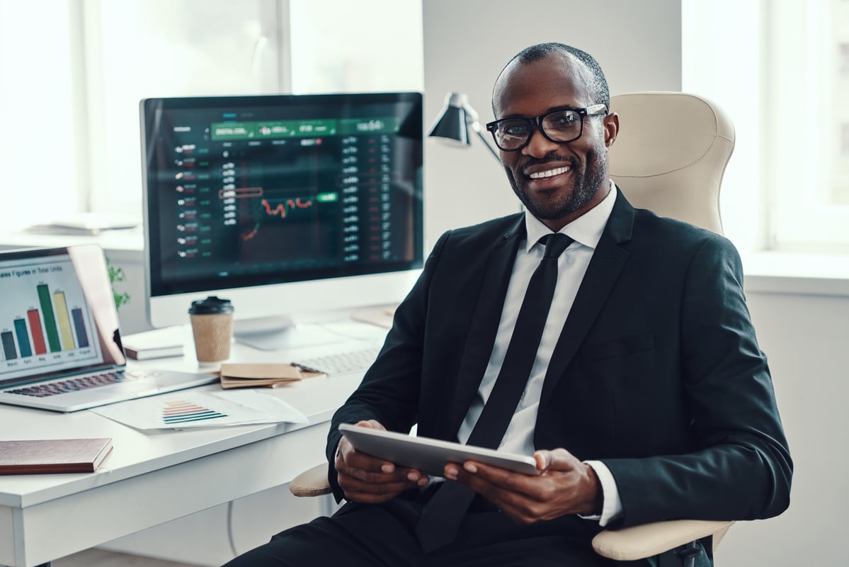 An investor at a desk.